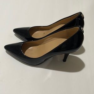 Black paten leather Michael Kors pumps
